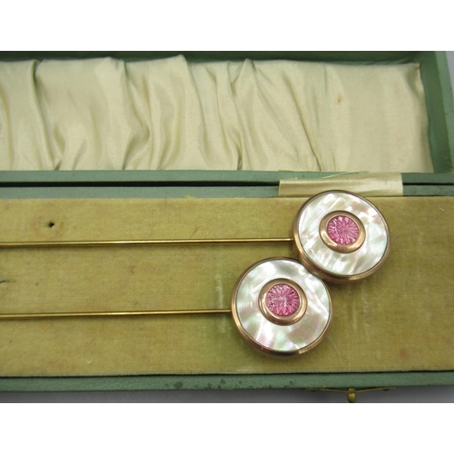 589 - Edwina Currie collection - Two cased yellow, metal mother of pearl and pink stone hat pins, L24cm