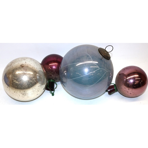 1261 - Four mercury glass witches balls, the larger two balls with inset metal hangers, max. D21cm