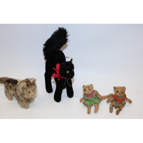 1270 - Steiff 'Tabby' cat with original paper tag, H10cm; Steiff black Halloween cat with yellow tag in ear... 