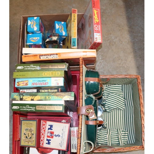 1272 - Collection of vintage board games in two boxes, Teletubbies vinyl figures, and a wicker picnic hampe... 