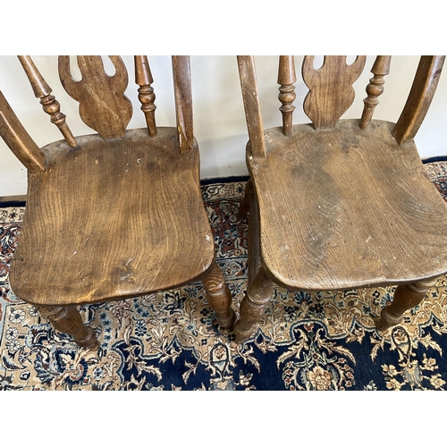 601 - Pair of 19th century elm farmhouse chairs, with pierced splats, H86cm (2)