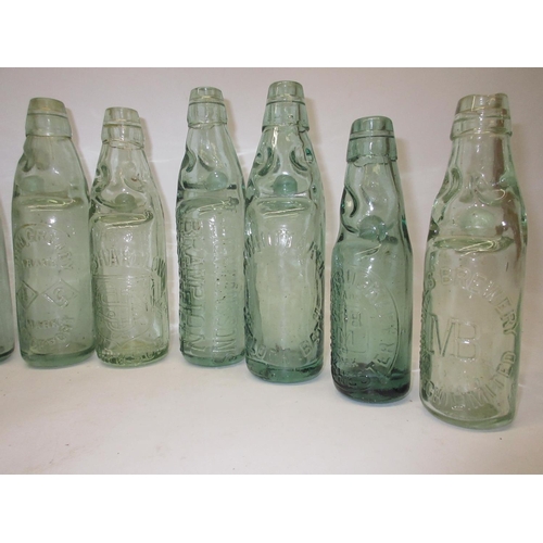 218 - Collection of fourteen Codd-neck bottles from across the UK, including Aldershot, Manchester, Daybro... 