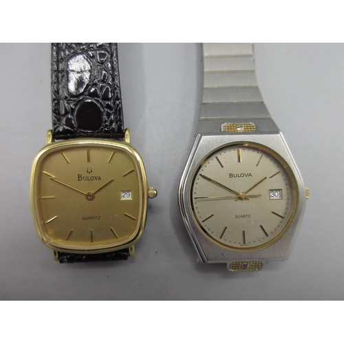 538 - Bulova stainless steel quartz wristwatch with date, signed parchment coloured dial, applied baton ho... 