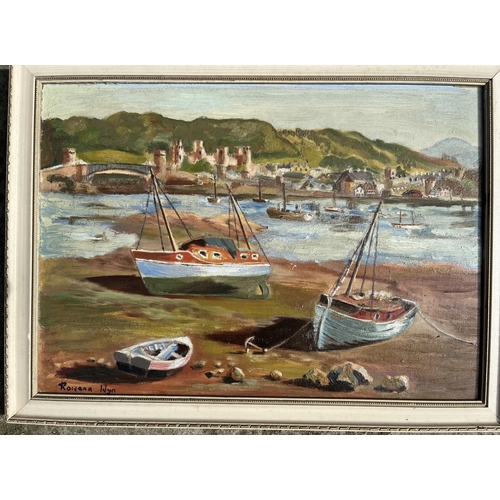 714 - Rowena Wyn Jones (British 1916-2003); Beached boats in an estuary, oil on canvas board, signed, 24cm... 