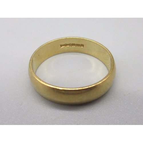 23 - 18ct yellow gold wedding band, stamped 750, size p, 4.24g