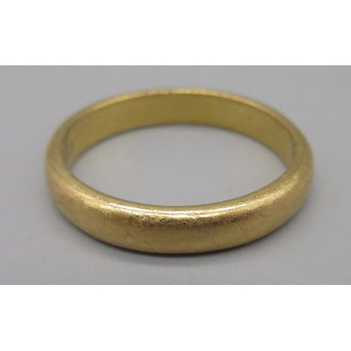 31 - 22ct yellow gold wedding band, stamped 22, size W, 8.58g