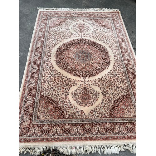 1131 - Kirman Shah cream ground wool rug, 140cm x 200cm