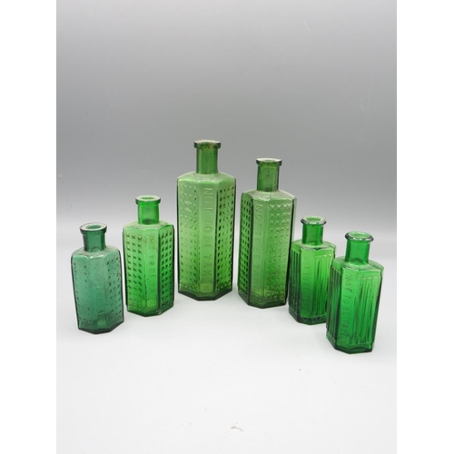 221 - Selection of six antique glassware poison bottles of varying designs and sizes