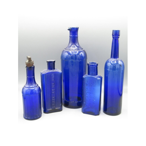 223 - Five antique glassware bottles incl. a laxative (Magnesium Citrate) bottle and a poison bottle (5)