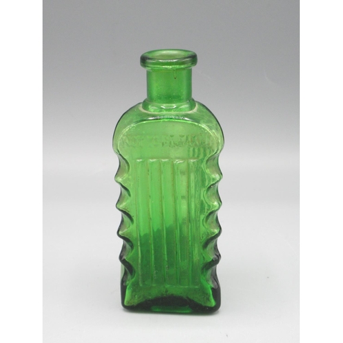 227 - Wilson's patent glass poison bottle, H10.5cm, 2oz