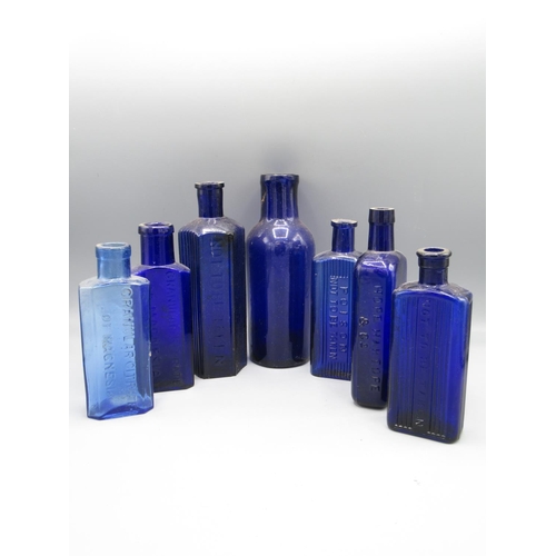 229 - Seven various blue glass bottles, including five poison bottles (7)