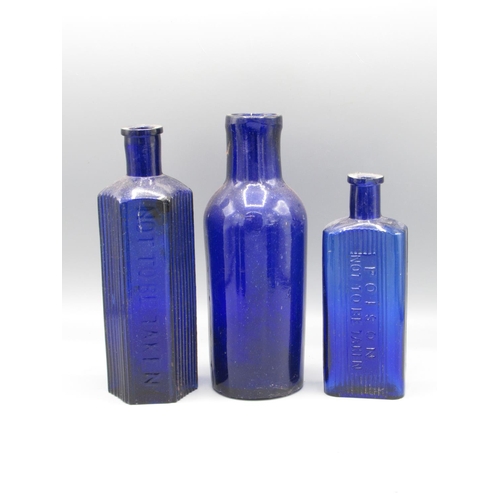 229 - Seven various blue glass bottles, including five poison bottles (7)