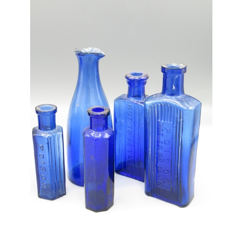 230 - Eleven small blue glass bottles, including four poison bottles (11)