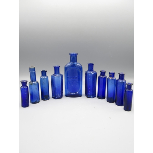 231 - Ten small blue glass bottles incl. three poison bottles and a 'Walfox Brand' bottle