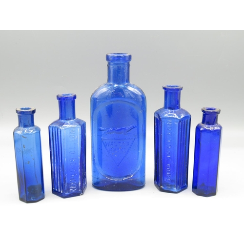 231 - Ten small blue glass bottles incl. three poison bottles and a 'Walfox Brand' bottle