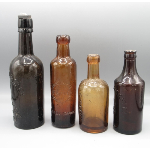 237 - Four antique amber glass bottles, including Globe, Whitbread and Co. London, Robinson and Speight Hu... 