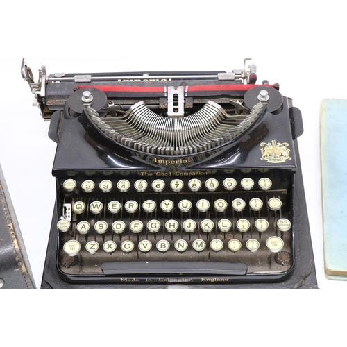 1198 - Imperial 'The Good Companion' typewriter in case, and Rational Typewriting 12th edition book (2)