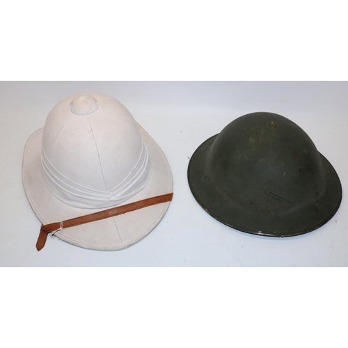 1292 - White pith helmet, and a WWII era steel brodie helmet (2)