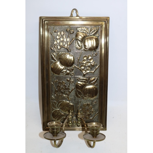 698 - Late Victorian Aesthetic Movement two-light candle sconce in the manner of Bruce Talbert, embossed w... 