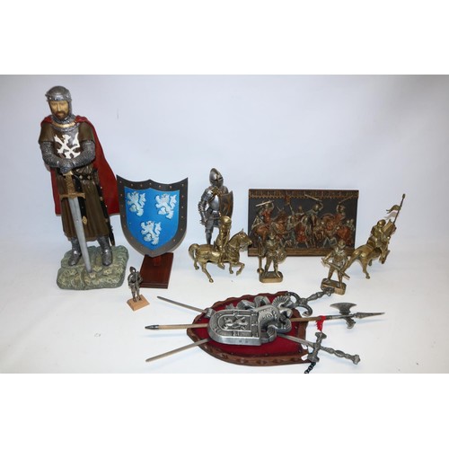 704 - Collection of figures of knights in armour and other related items, incl. plaster plaque depicting t... 