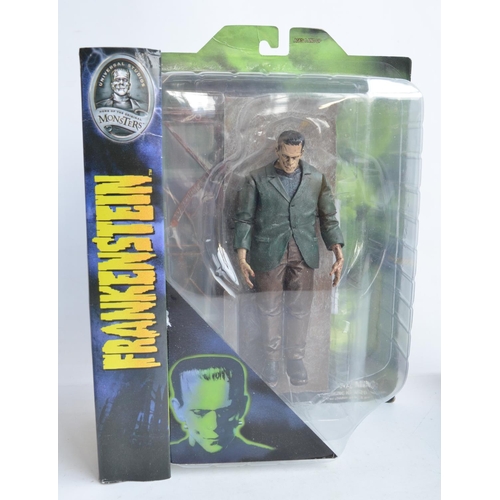 1113 - WITHDRAWN Three Frankenstein related action figure models, all in mint condition inside at least goo... 