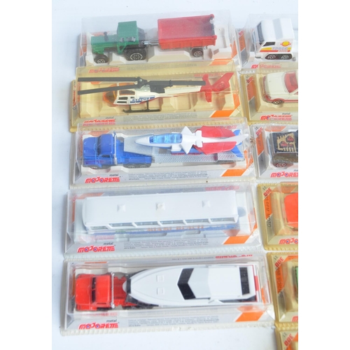 338 - Sixteen unopened diecast model vehicle sets from Majorette in a shop display box (damage/tape to box... 