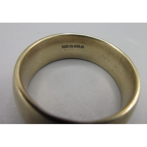 172 - 9ct yellow gold wedding band, stamped 375, size T1/2, 9.7g