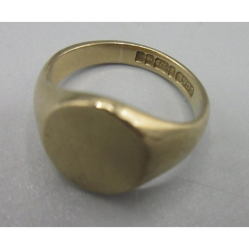 182 - 9ct yellow gold signet ring with plain oval face, stamped 375, size H, 4.0g