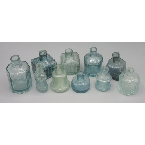 251A - Ten various clear glass inkwells (10)