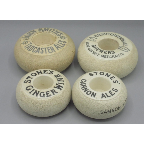 257 - Four brewery branded ceramic match strikers, incl. John Smiths, R. N. Hutchinson, Stone's Ginger Win... 