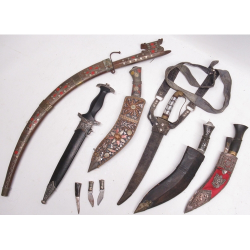 684 - Selection of six mostly eastern knifes, including three Kukri knifes and a Indonesian short sword. (... 