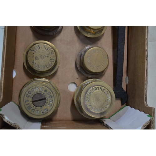 278 - Eight vintage brass carriage wheel nuts to include Pearson (Stockton), Howcroft Carr Co (West Hartle... 