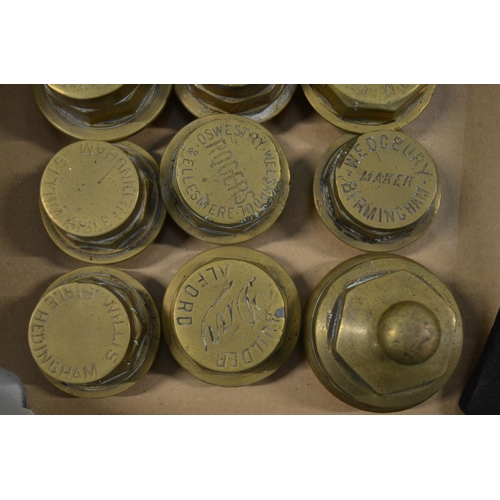 279 - Twelve vintage brass carriage wheel nuts to include J Marsh (Boston), C Youngs (Wormegay), Wedgbury ... 