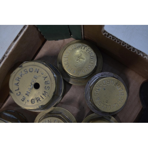 281 - Twelve vintage brass carriage wheel nuts to include 2x Burlington Carriage Co Ltd (315 Oxford Street... 