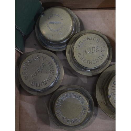 281 - Twelve vintage brass carriage wheel nuts to include 2x Burlington Carriage Co Ltd (315 Oxford Street... 