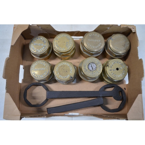 282 - Eight vintage brass carriage wheel nuts to include F.E. Walton (Long Sutton), Howlett & Sons (Peterb... 