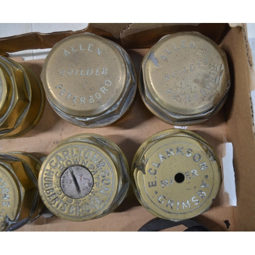 282 - Eight vintage brass carriage wheel nuts to include F.E. Walton (Long Sutton), Howlett & Sons (Peterb... 