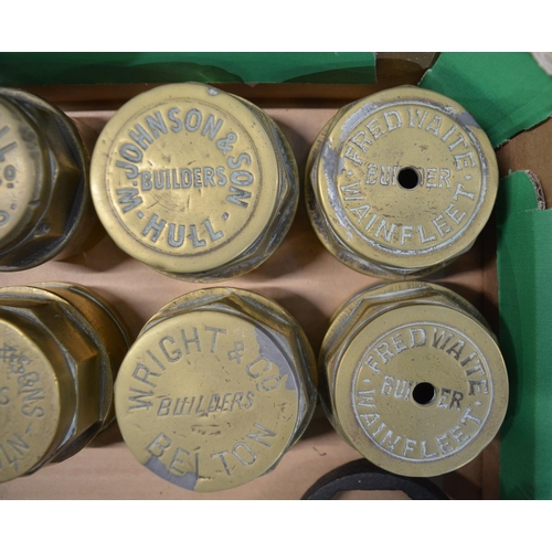 283 - Eight vintage brass carriage wheel nuts to include Allen (Peterboro), W. Rainforth (Lincoln), Wright... 