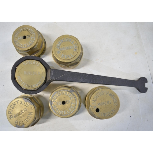 283 - Eight vintage brass carriage wheel nuts to include Allen (Peterboro), W. Rainforth (Lincoln), Wright... 