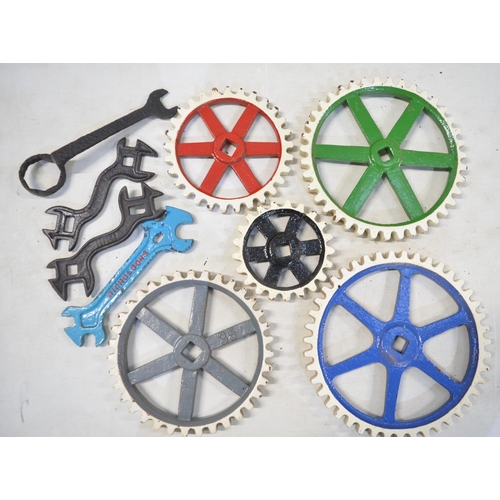 285 - Collection of vintage cast steel cogs (repainted) and 4 spanners/wrenches, one marked Nicholsons. La... 