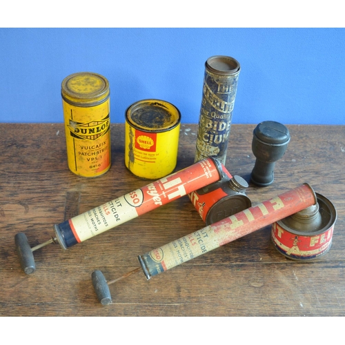 286 - Three vintage steel tins to include Shell grease (partially full), Dunlop and Bryterlite, 2x Esso Fl... 