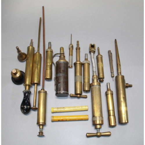 306 - Collection of brass grease guns, oilers, pumpstyre pressure gauges, etc.