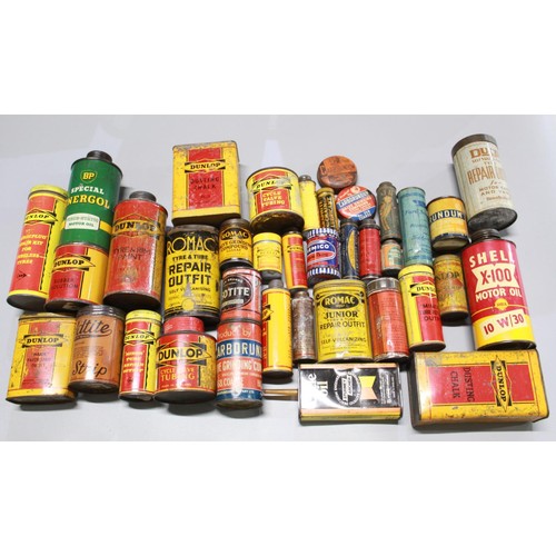 319 - A large collection of tyre repair and lubrication tins