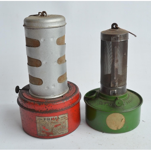 274 - Seven vintage paraffin heaters to include Raydyot, Plumbob, Chalwyn, Prima 8 day etc. Also included ... 