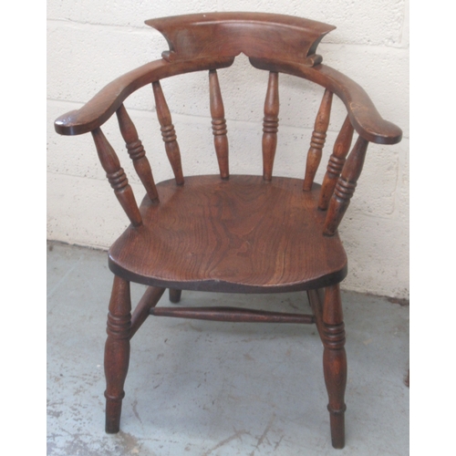 751 - 20th century beech and elm Smokers Bow type arm chair, on turned supports with stretchers