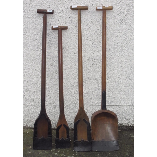 354 - Four wooden-handled Lincolnshire ditching spades in various styles and sizes