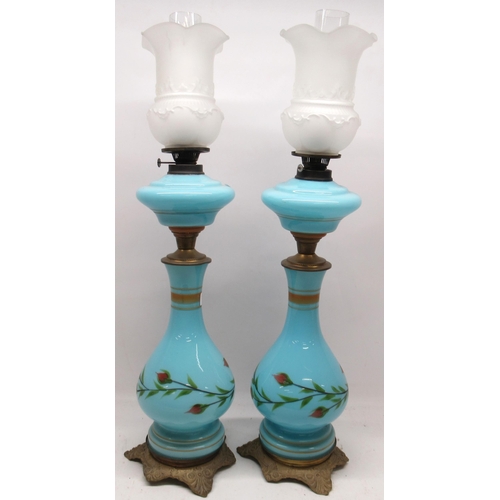 419 - 19th century pair of glass oil lamps, opaque duck egg blue glass bodies and reservoirs, hand painted... 