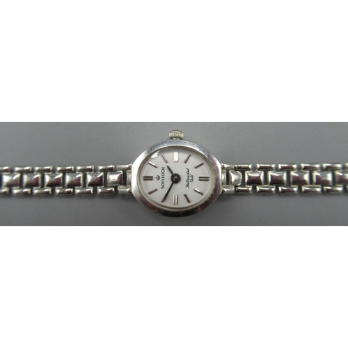 677A - WITHDRAWN Ladies Sovereign 9ct white gold quartz wristwatch on integrated bracelet, signed white dia... 