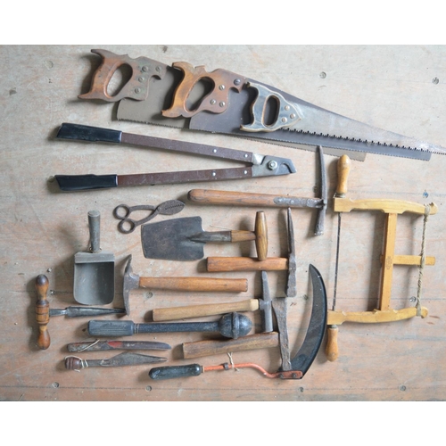 374 - Selection of vintage tools, including saws, seed drillers, edging tools etc.