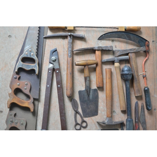 374 - Selection of vintage tools, including saws, seed drillers, edging tools etc.